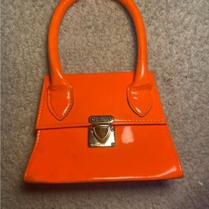 Small and cute orange clutch purse